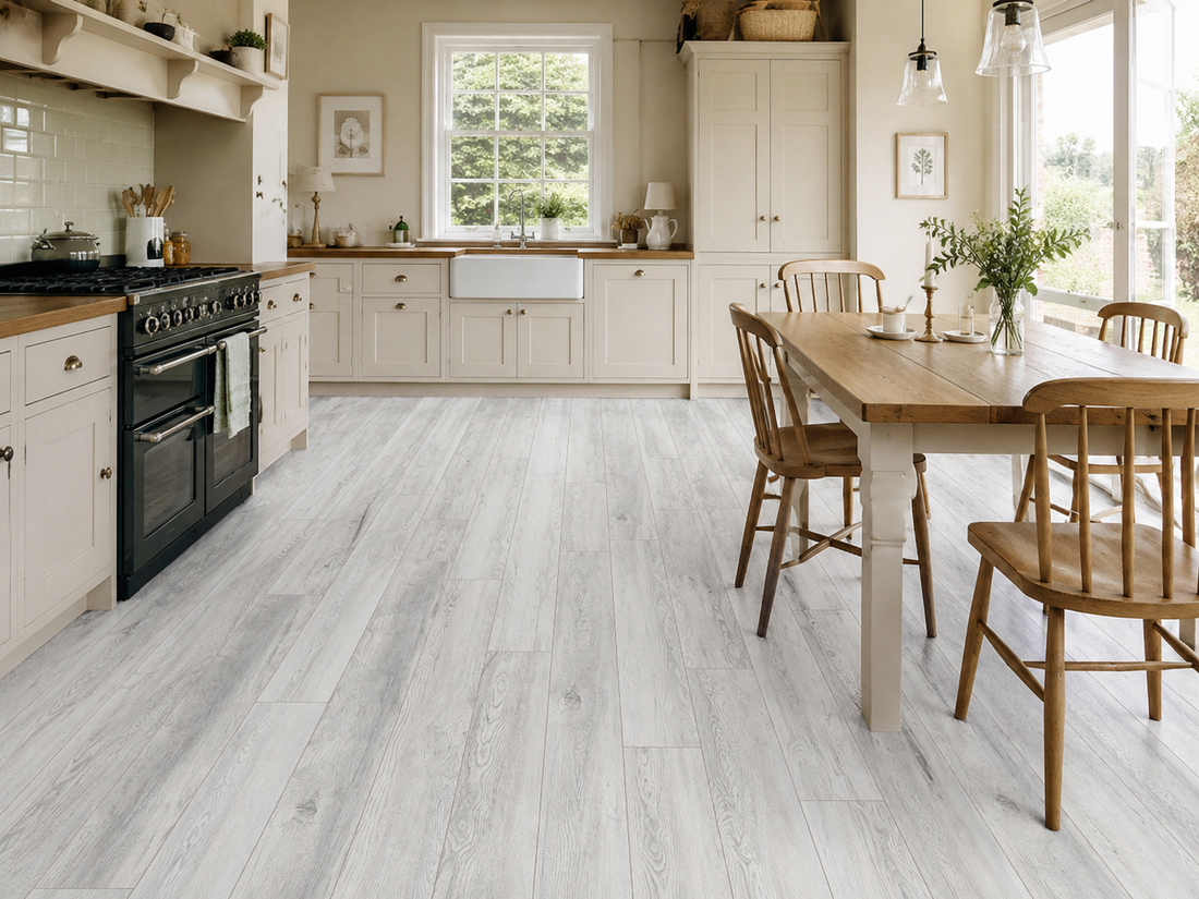 Girona Oak 12mm Plank Laminate in a furnished room