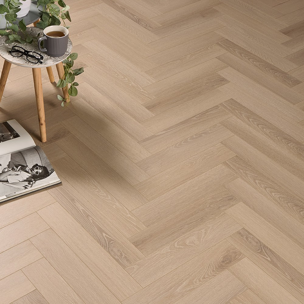 Esbjerg light smoked oak herringbone laminate flooring