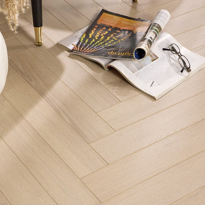 Halmstad pale washed oak herringbone laminate flooring