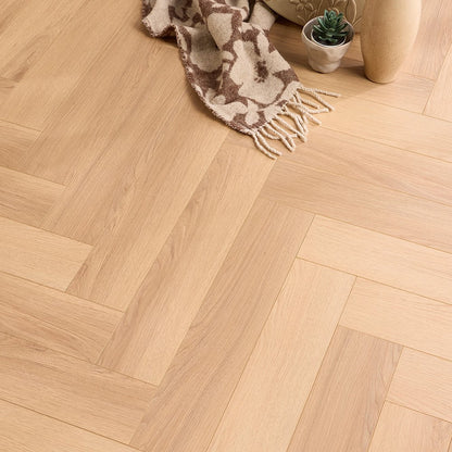 Tromso warm natural oak herringbone laminate flooring