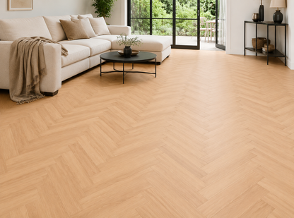 Tromso warm oak herringbone laminate in a contemporary living room